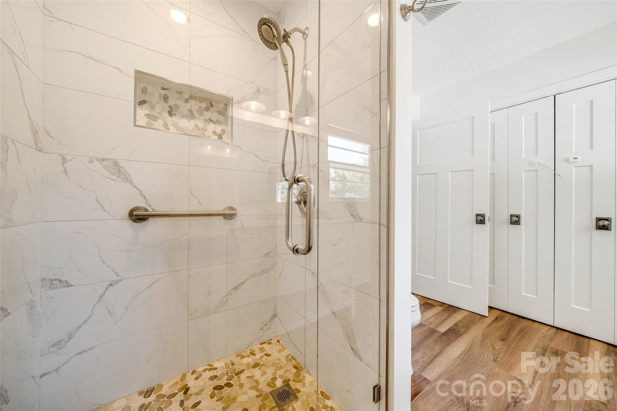 Primary ensuite updated bathroom with extra storage - 69 Milburn Lane, Hendersonville