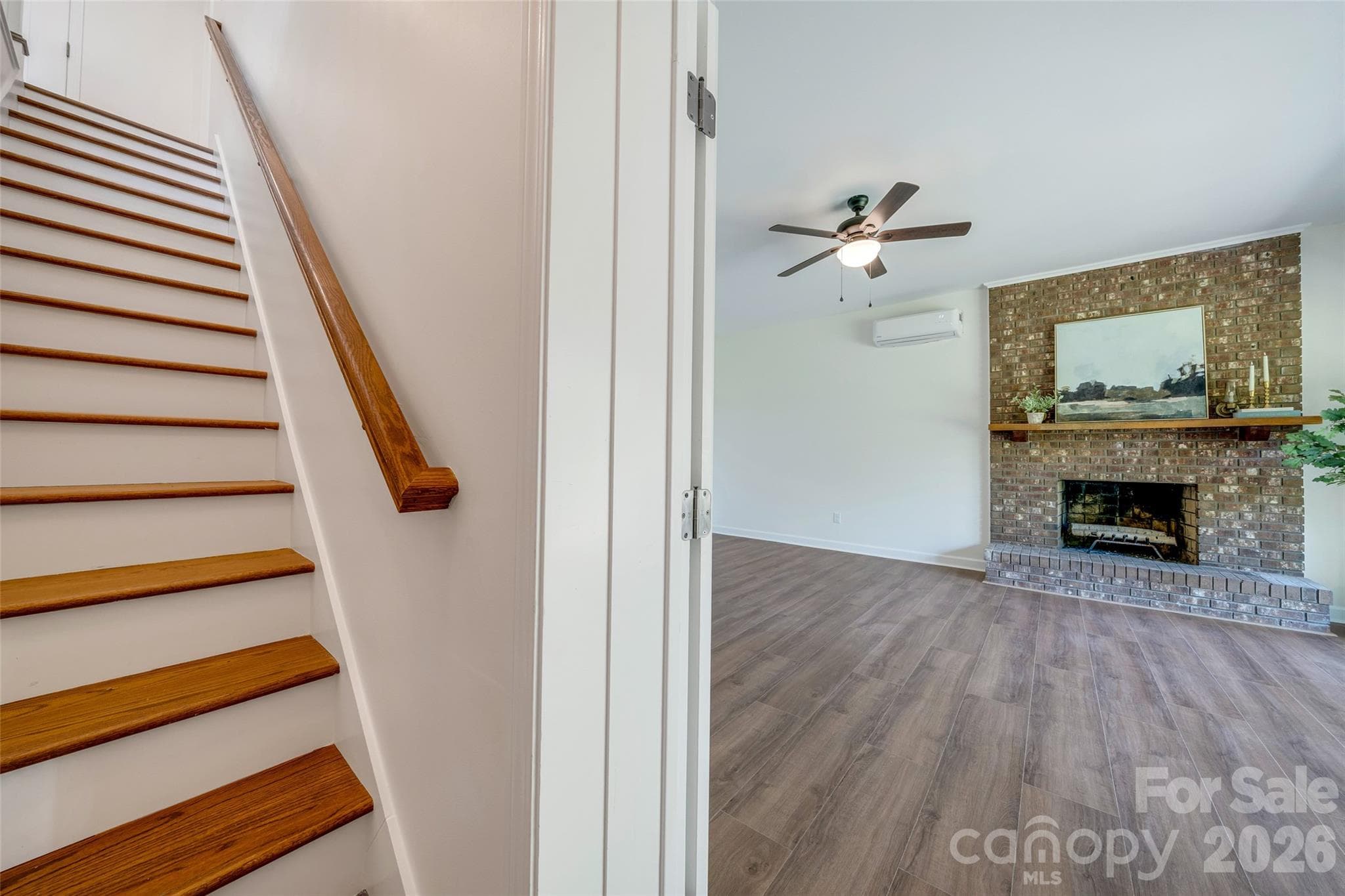 Stairway to the daylight basement level - 69 Milburn Lane, Hendersonville
