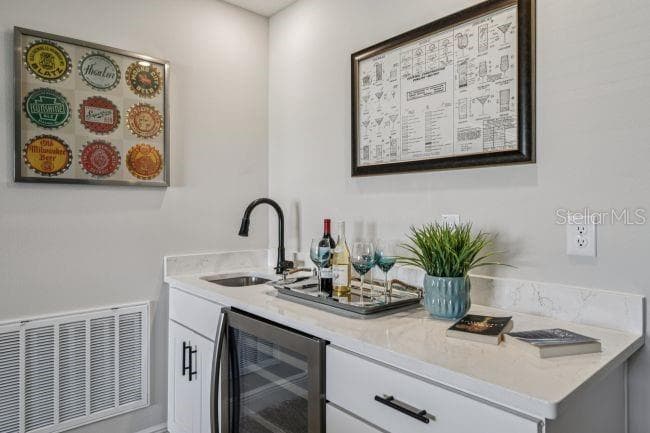 Model home - actual features may vary. - 52 CACTUS ST E, HOMOSASSA