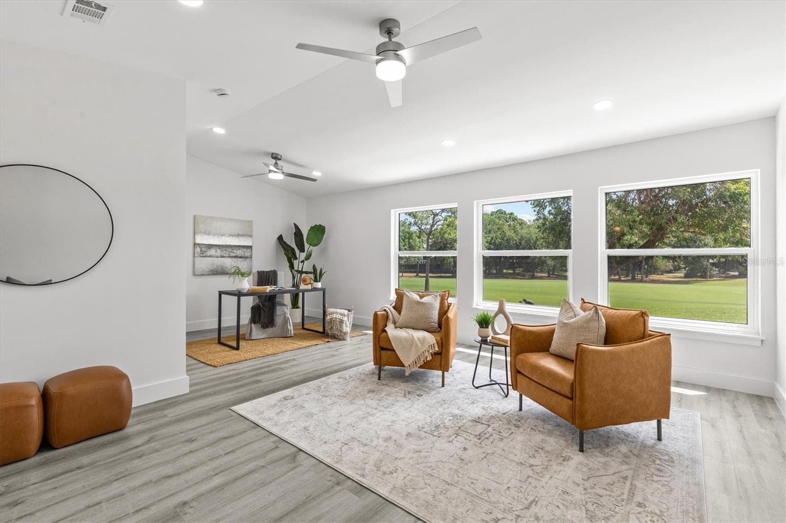 Primary suite sitting area/ office - 13915 WHISPERWOOD DR, CLEARWATER