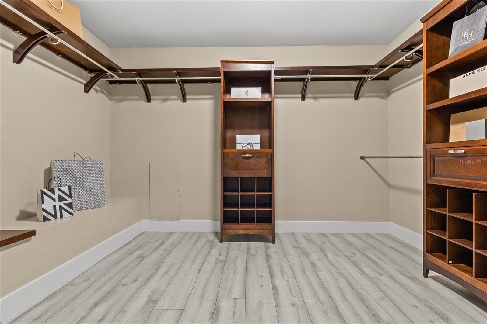 Primary closet 1 - 13915 WHISPERWOOD DR, CLEARWATER