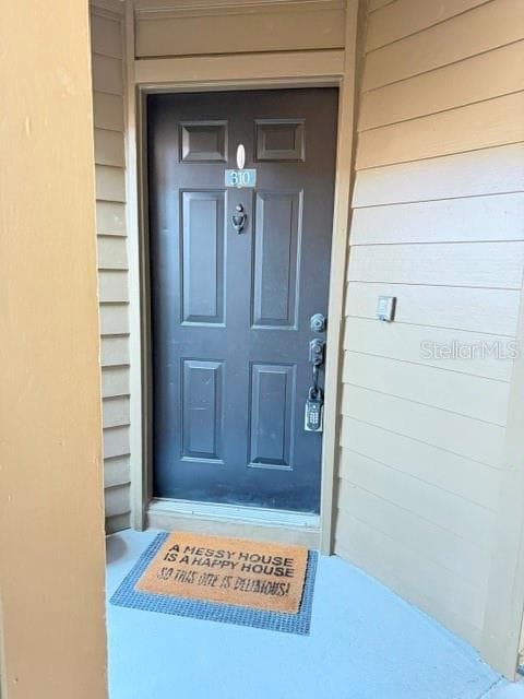 Unit 310 front door landing - 420 SUMMIT RIDGE PL #310, LONGWOOD