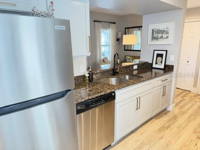 Counter / sink side with pass through to dining and living room areas - 420 SUMMIT RIDGE PL #310, LONGWOOD