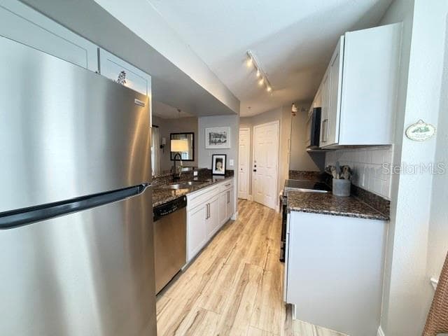 Kitchen over view - refrigerator, granite counter tops new cabinets new LV floors - 420 SUMMIT RIDGE PL #310, LONGWOOD
