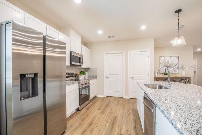 Model home - actual features may vary. - 12003 ROBINA RD, WEEKI WACHEE