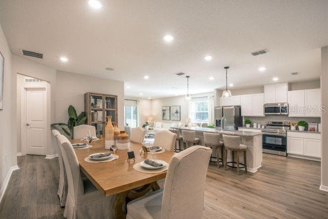 Model home - actual features may vary. - 12003 ROBINA RD, WEEKI WACHEE