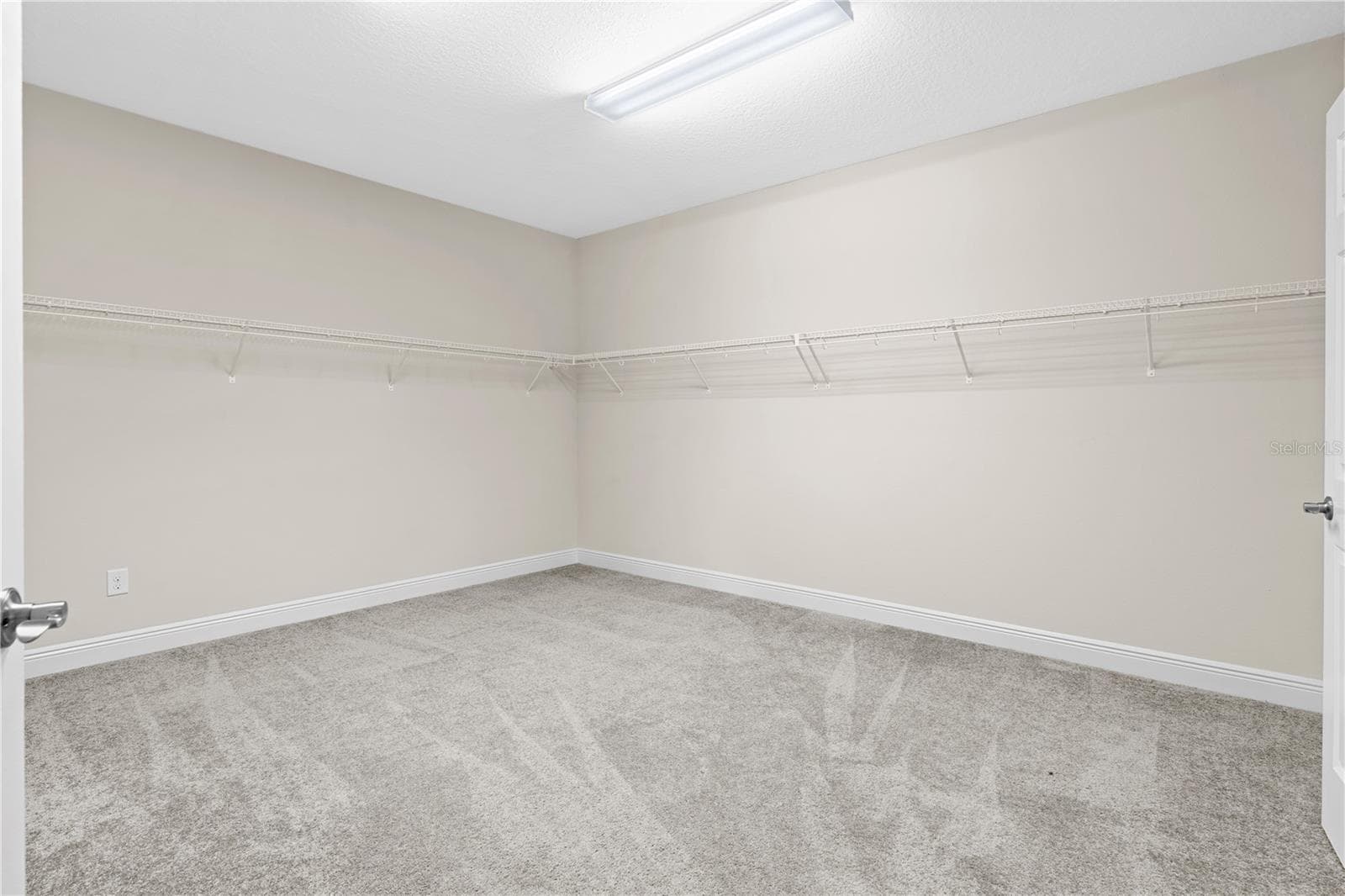 upstairs master closet - 13830 MOONSTONE CANYON DR, RIVERVIEW