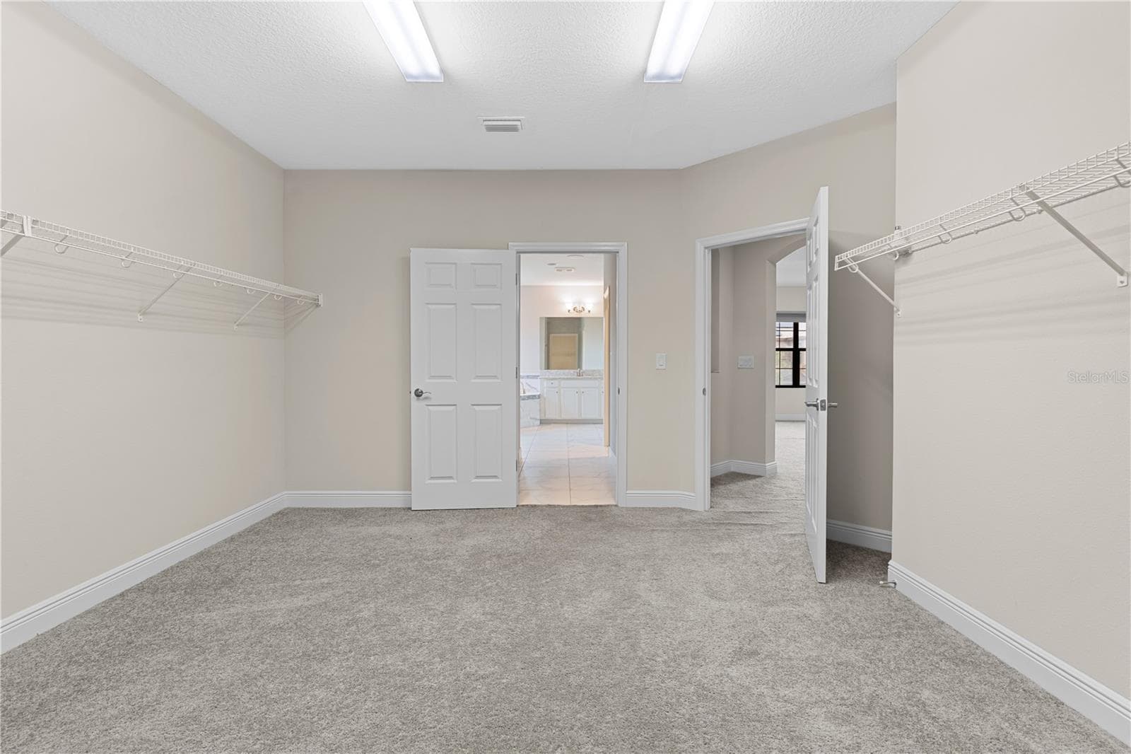 upstairs master closet - 13830 MOONSTONE CANYON DR, RIVERVIEW
