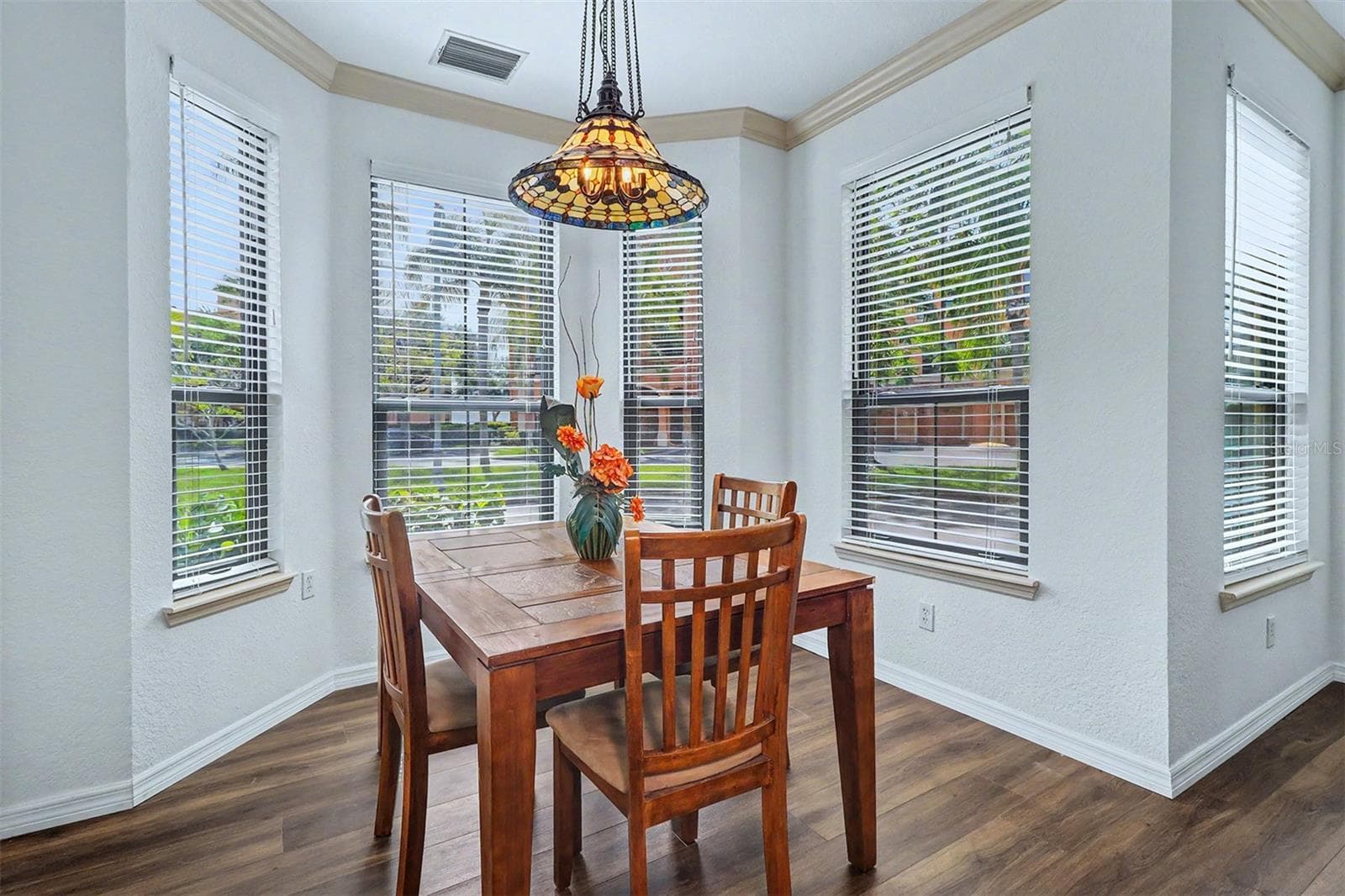 Dining area with bay window - 2746 VIA TIVOLI #110B, CLEARWATER