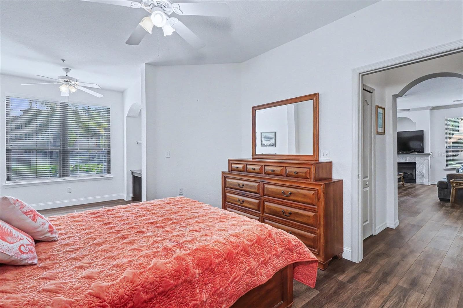 Primary bedroom showing hallway that has a coat closet - 2746 VIA TIVOLI #110B, CLEARWATER