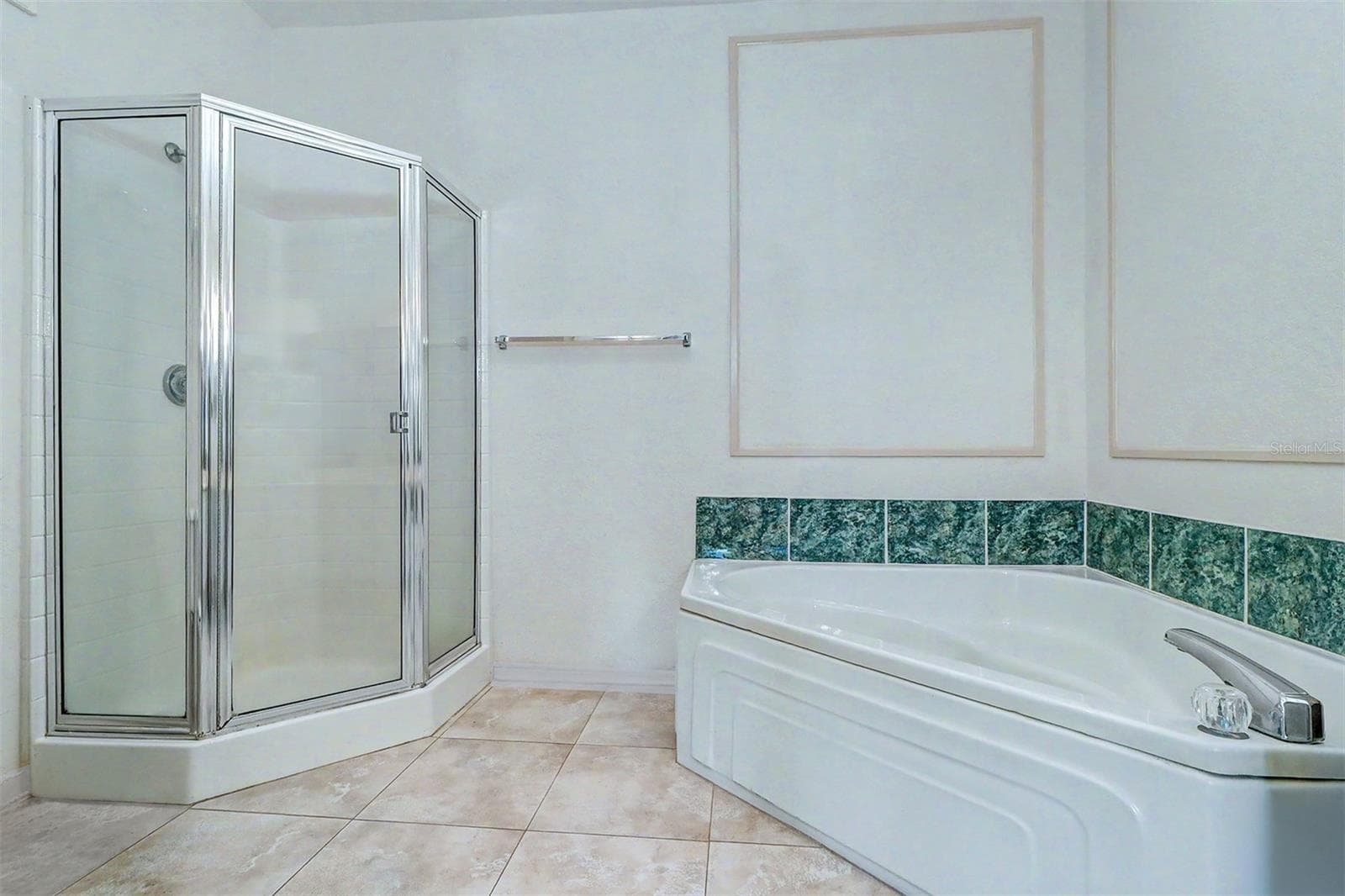 Primary bathroom garden tub and separate shower - 2746 VIA TIVOLI #110B, CLEARWATER