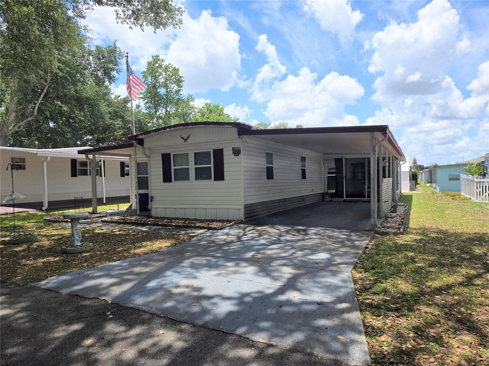 Manufactured Home at 6235 PARKSEND LN, ZEPHYRHILLS, photo 2 of 34