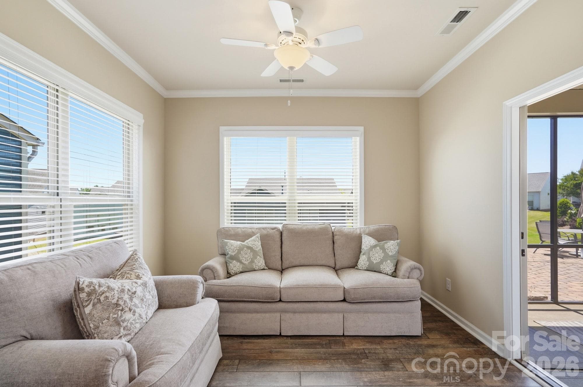 A beautiful sunroom just off the kitchen eating area flows right into the screened-in porch—perfect for morning coffee, casual meals, entertaining, or simply enjoying the outdoors! - 2331 Currant Street, Fort Mill