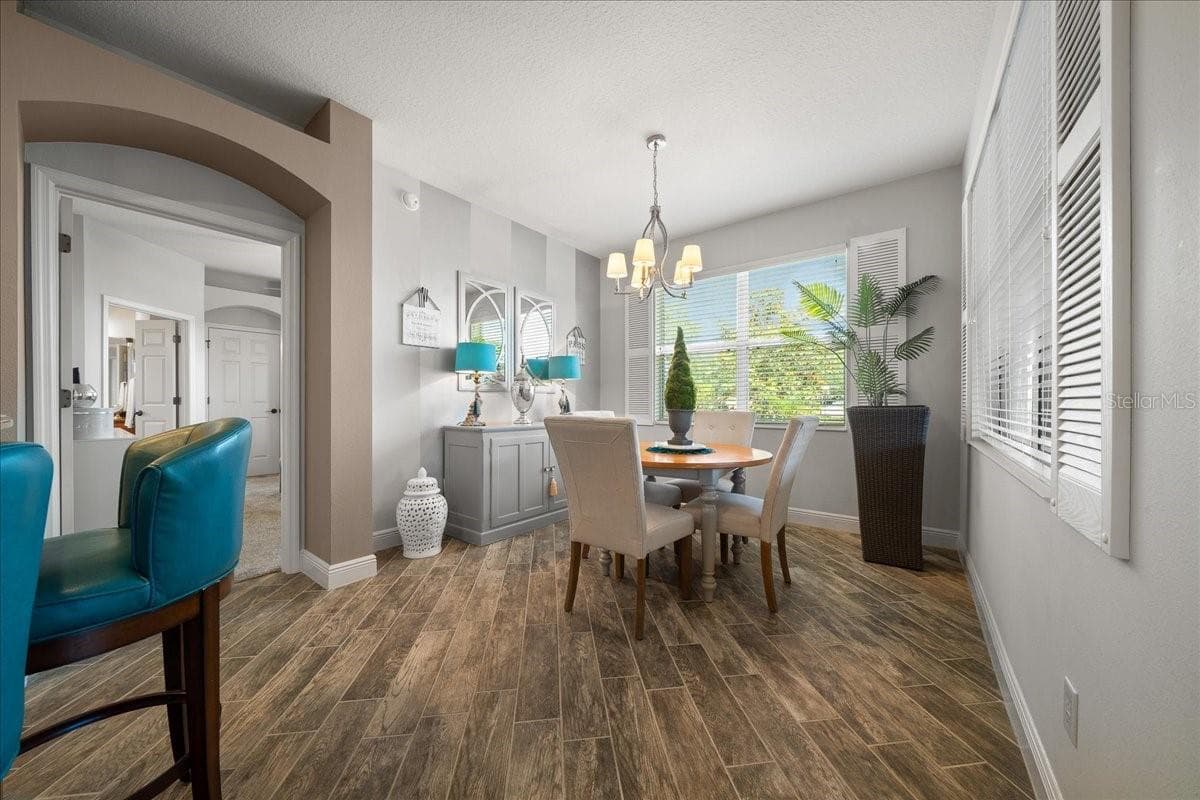Dining Room Features Stylish Interior Shutters - 1606 SNELLING AVE, THE VILLAGES