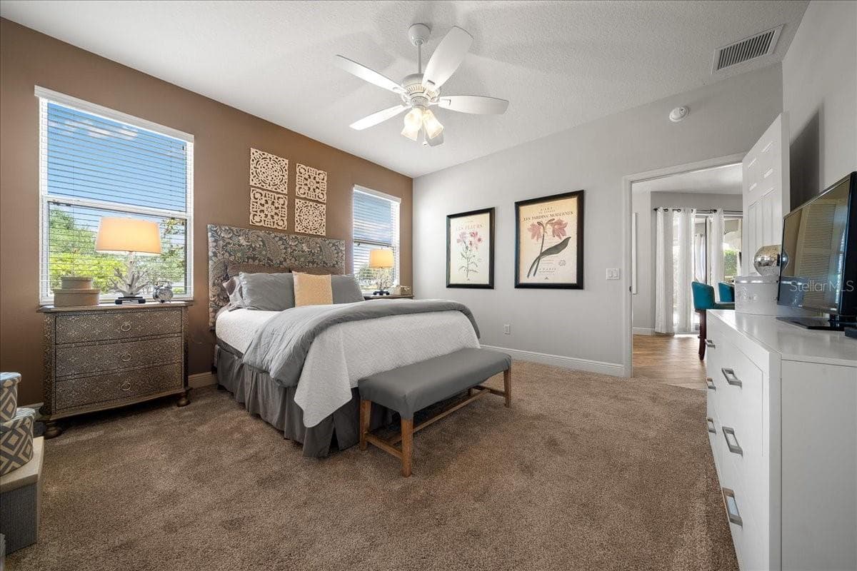 Primary Bedroom Features New Carpet & Fresh Paint - 1606 SNELLING AVE, THE VILLAGES