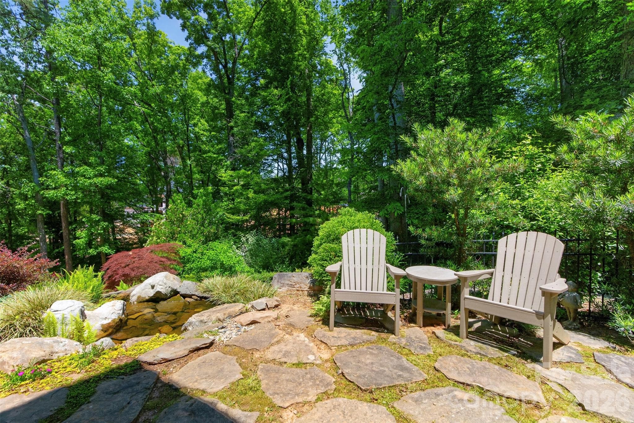 Lower Stone Patio with Water Fall Feature - Belmont