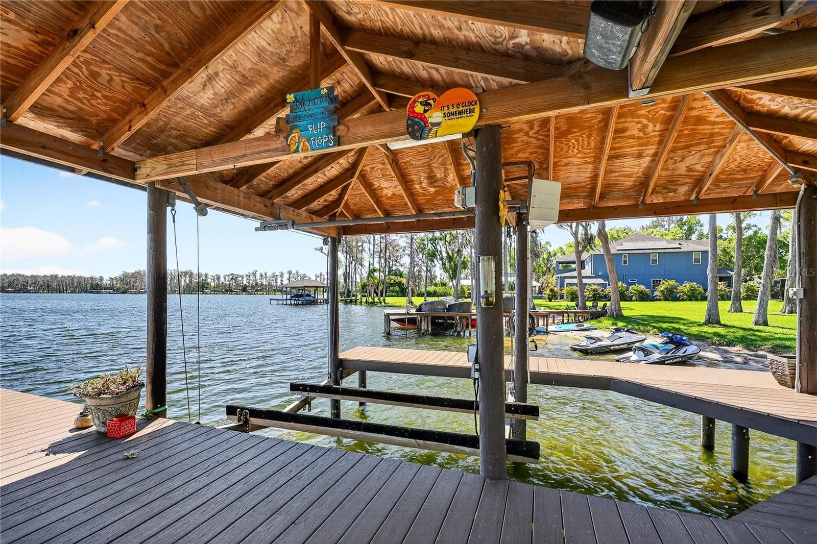 Covered dock with boat lift - 19801 GUNN HWY, ODESSA