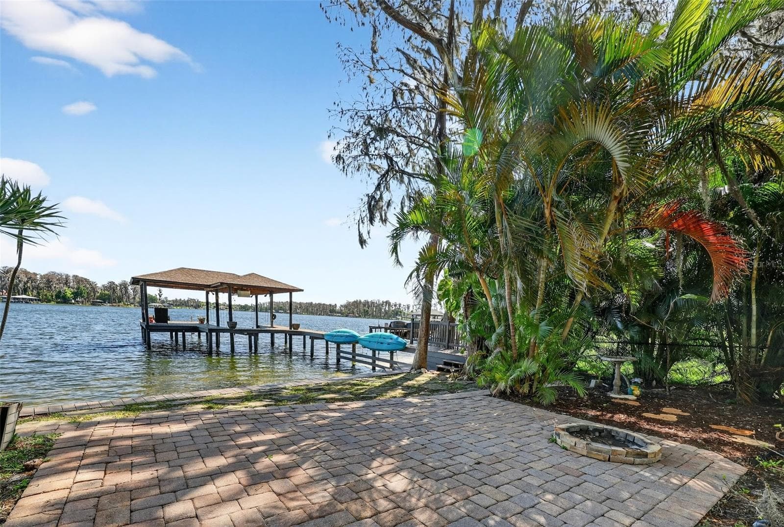 Paved area for entertaining with firepit. - 19801 GUNN HWY, ODESSA