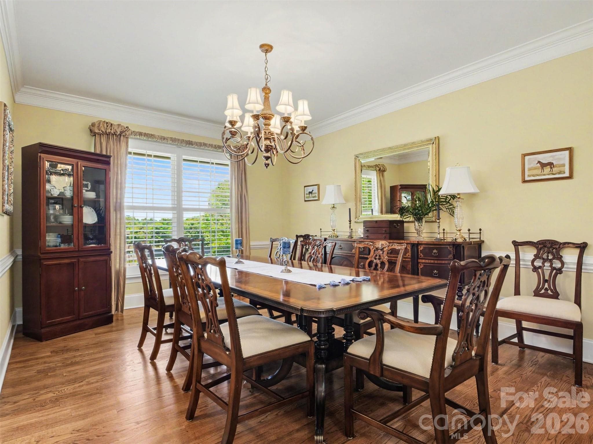 To the left of the foyer is the cheerful dining room. All draperies remain. - 1422 Stone Gate Drive, Shelby