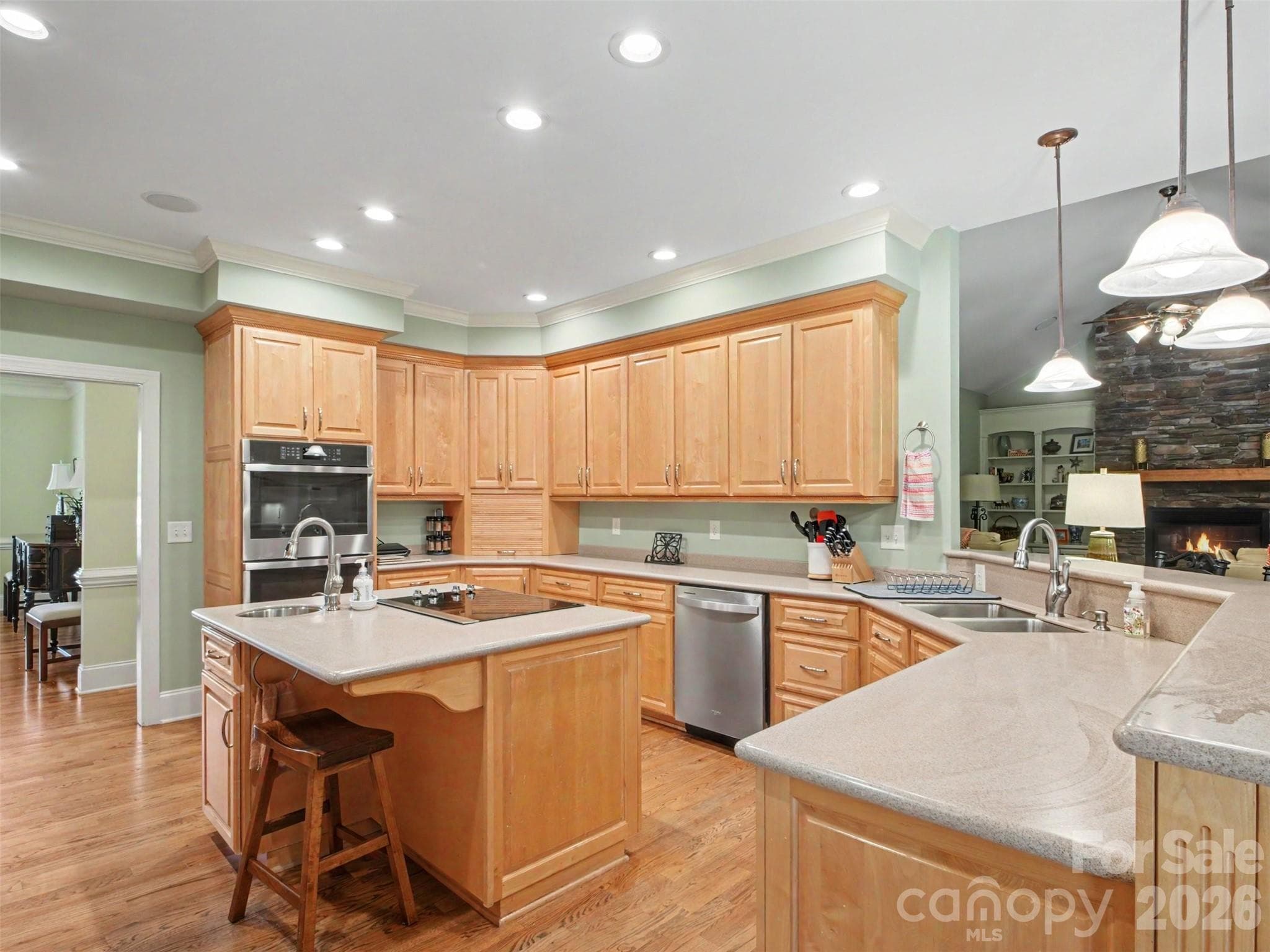 ...abundant cabinet and counter space, a bar that wraps around into the family room,... - 1422 Stone Gate Drive, Shelby