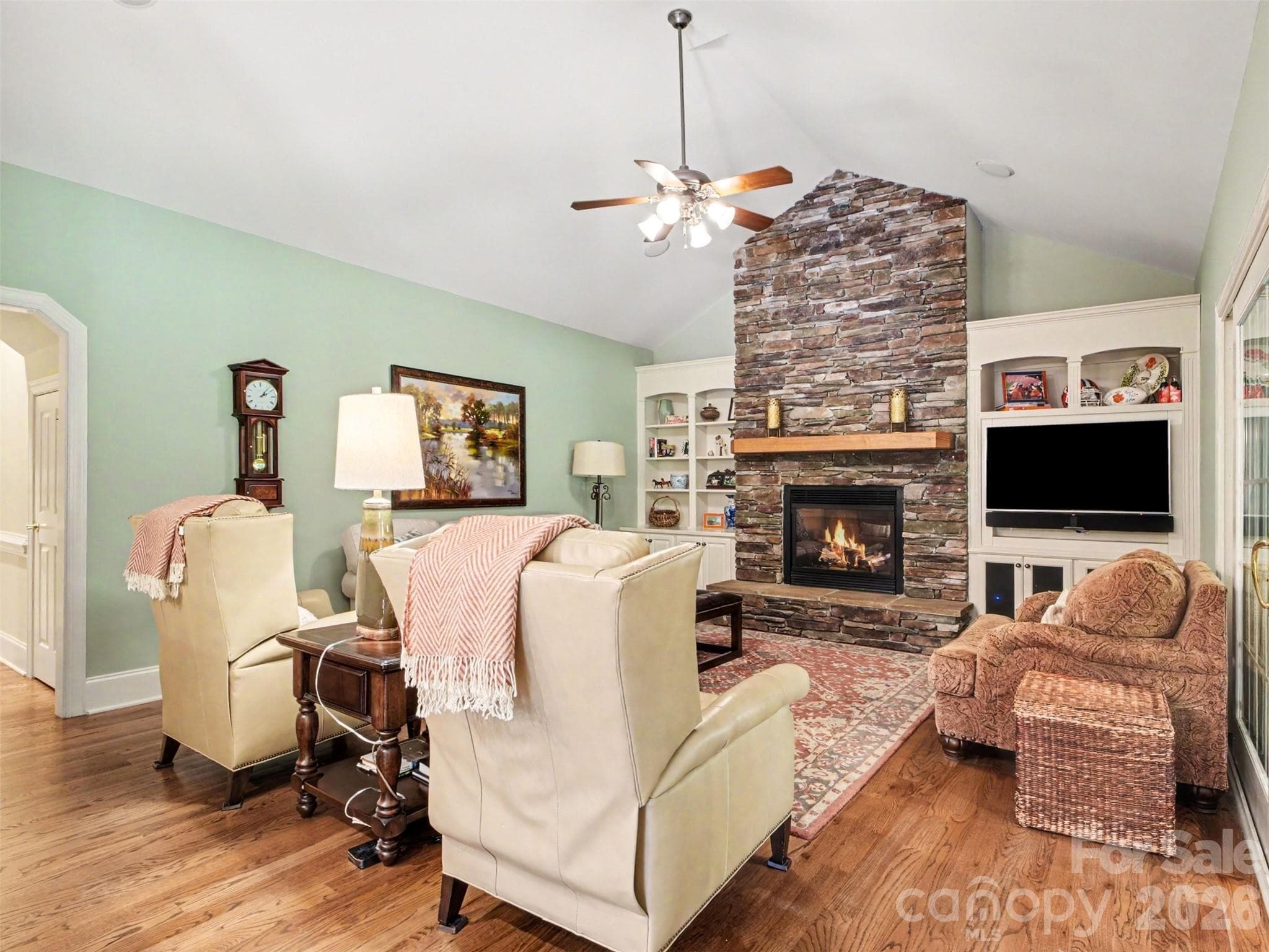 The kitchen/breakfast area flows into this fabulous family room with a vaulted ceiling... - 1422 Stone Gate Drive, Shelby