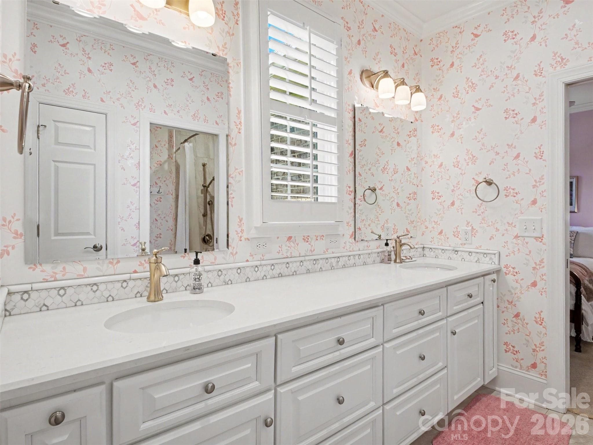 Vanity with double sinks and plenty of drawer space in the Jack and Jill bath - 1422 Stone Gate Drive, Shelby