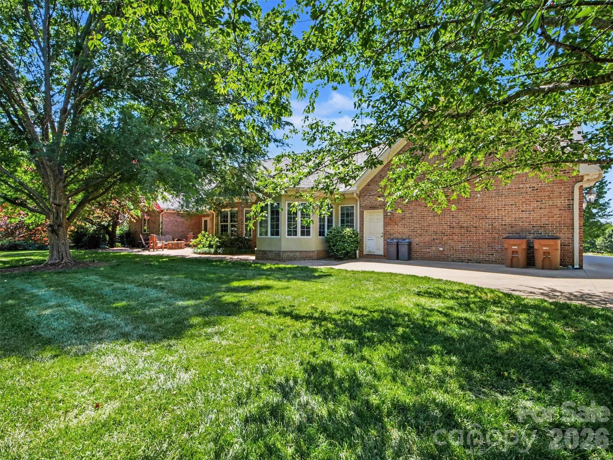 The garage has an exterior door to the back yard along with an Invisible Fence-controlled dog door! - 1422 Stone Gate Drive, Shelby