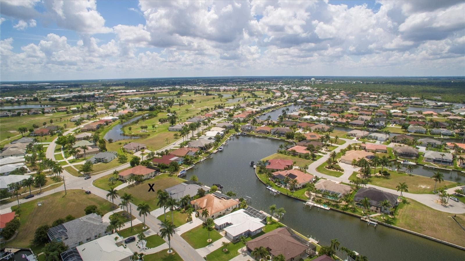 What a view looking southward towards the Gulf.  To the east is Twin Isles Golf & Country Club. - 507 MADRID BLVD, PUNTA GORDA