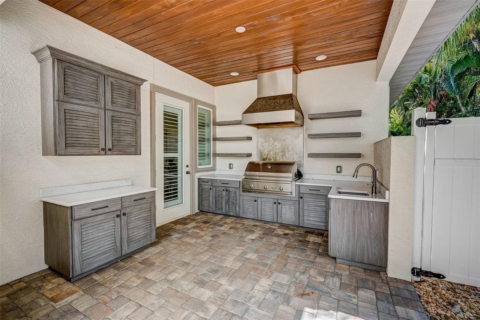 Outdoor grill area off kitchen - 125 S BLVD OF PRESIDENTS, SARASOTA