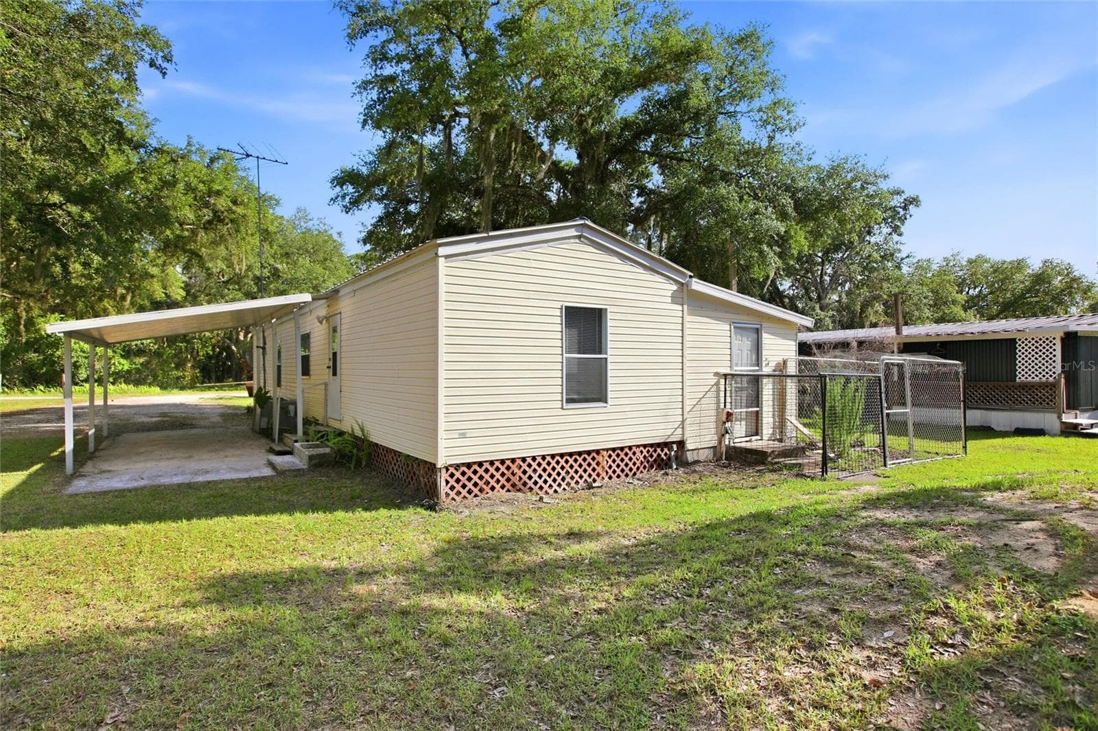 Manufactured Home at 3348 OMEC ST, LAKE WALES, photo 5 of 63