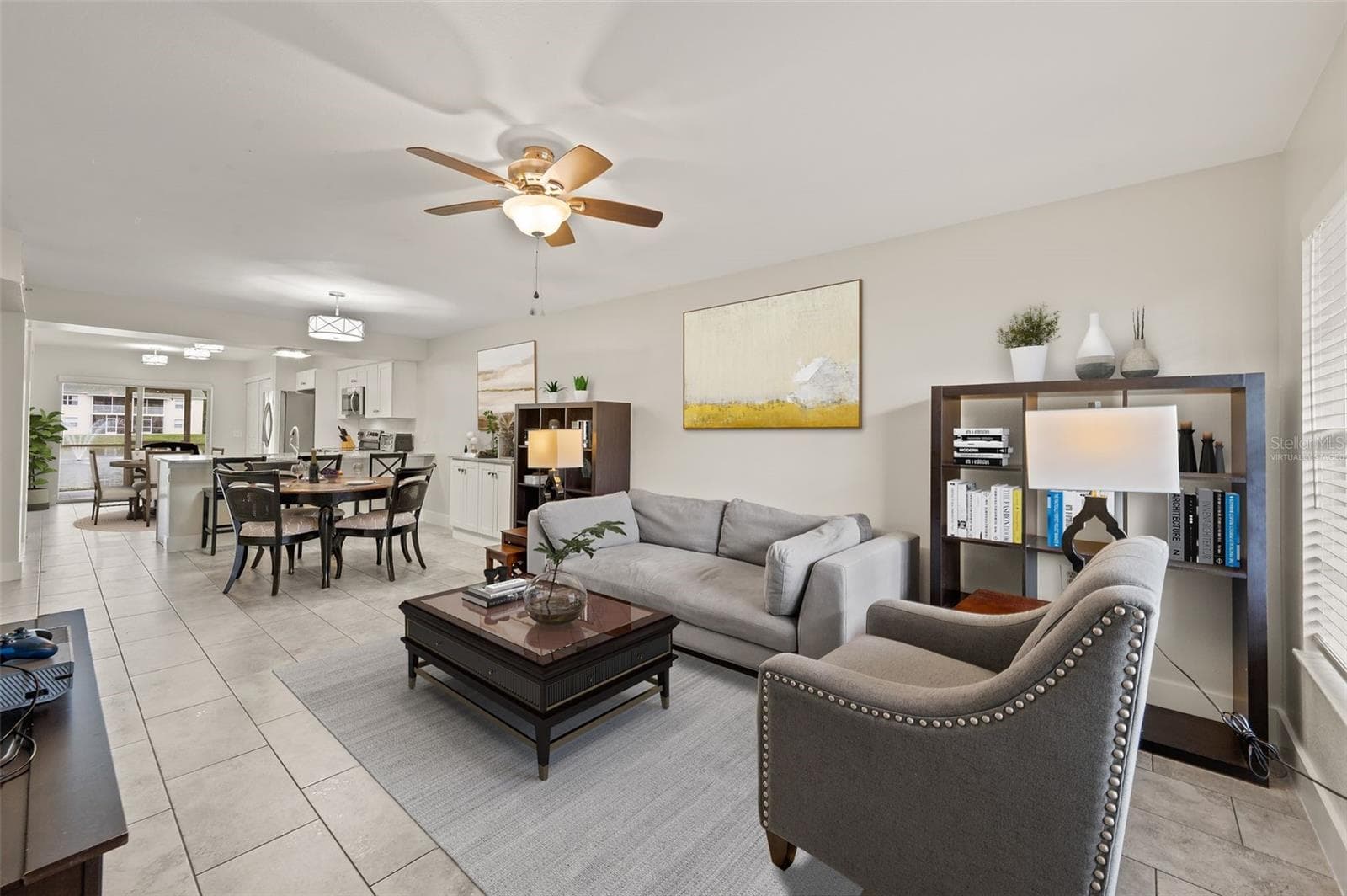 Virtually Staged with decorative items - 4910 COUGAR CT N #103, NAPLES