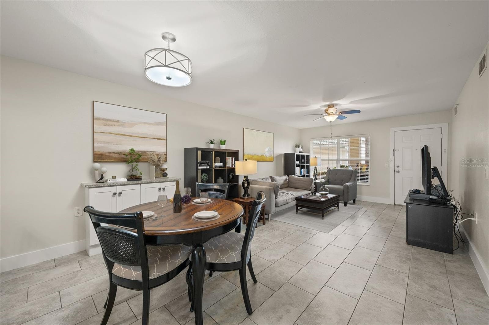 Virtually Staged with decorative items - 4910 COUGAR CT N #103, NAPLES