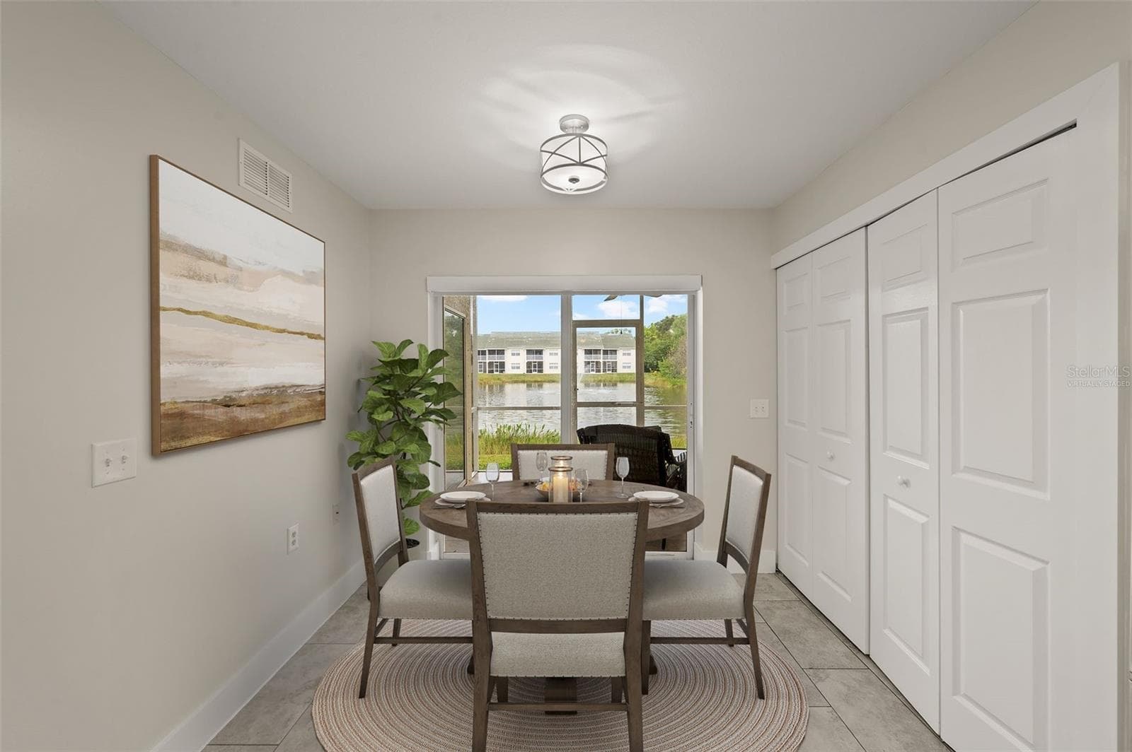 Kitchen Dining Area - Virtually Staged - 4910 COUGAR CT N #103, NAPLES
