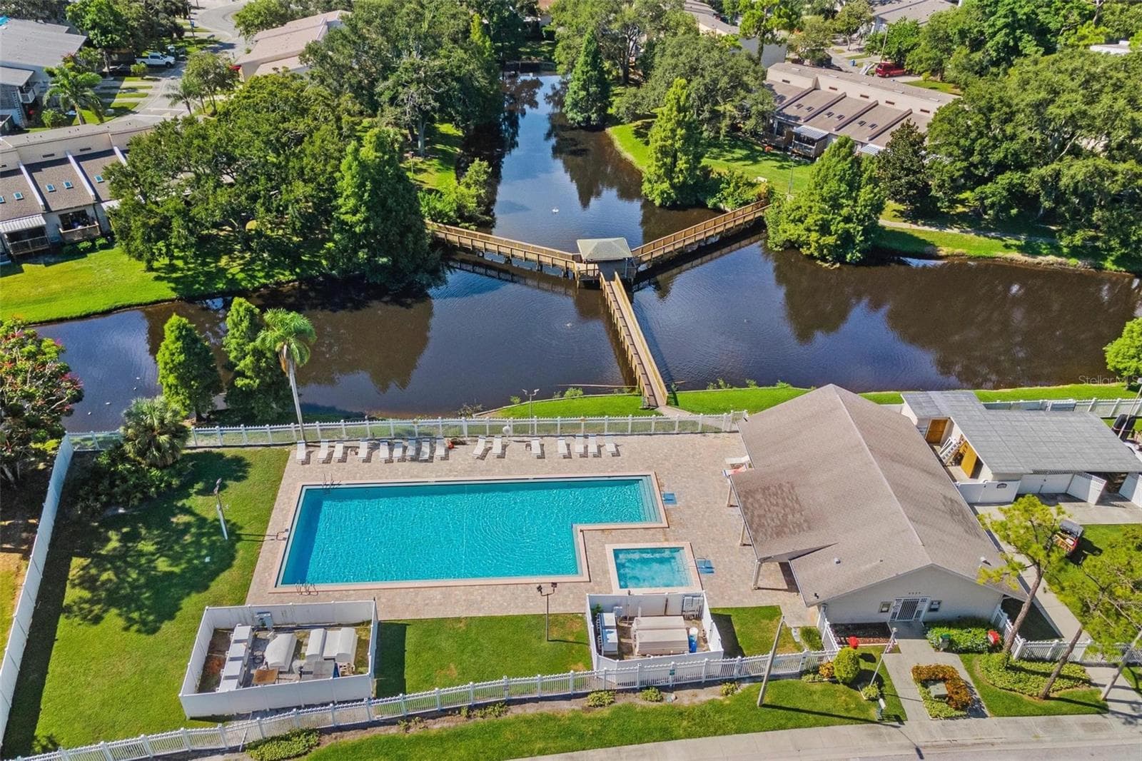 Community pool and spa - 6389 93RD TER N #4706, PINELLAS PARK