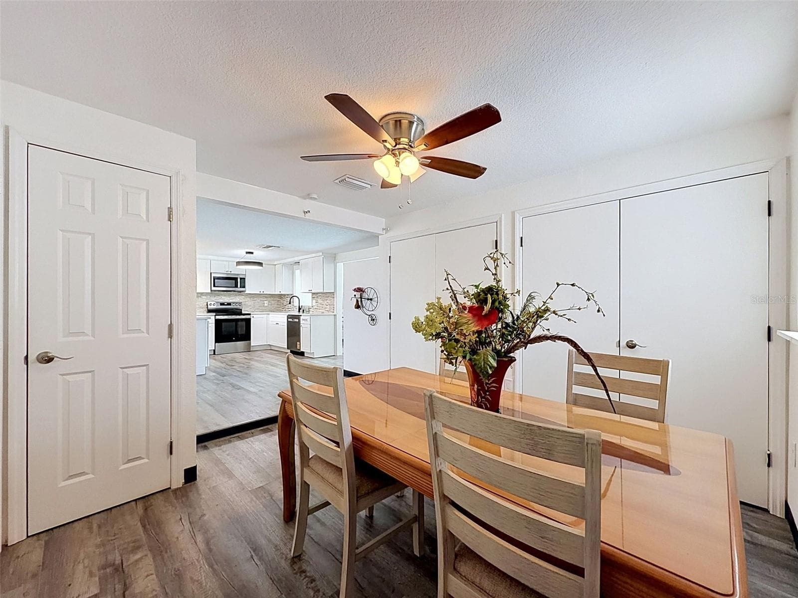 Flexible dining area with open flow to living spaces. - 12735 1ST ISLE, HUDSON