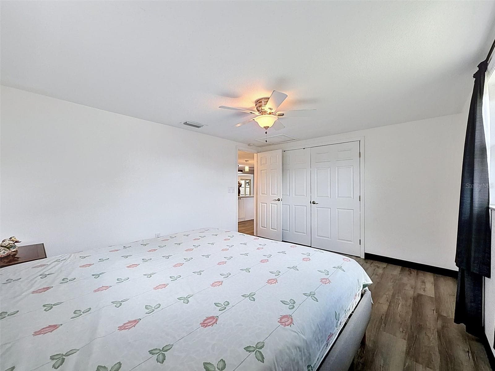 Bright and airy secondary bedroom with coastal feel. - 12735 1ST ISLE, HUDSON