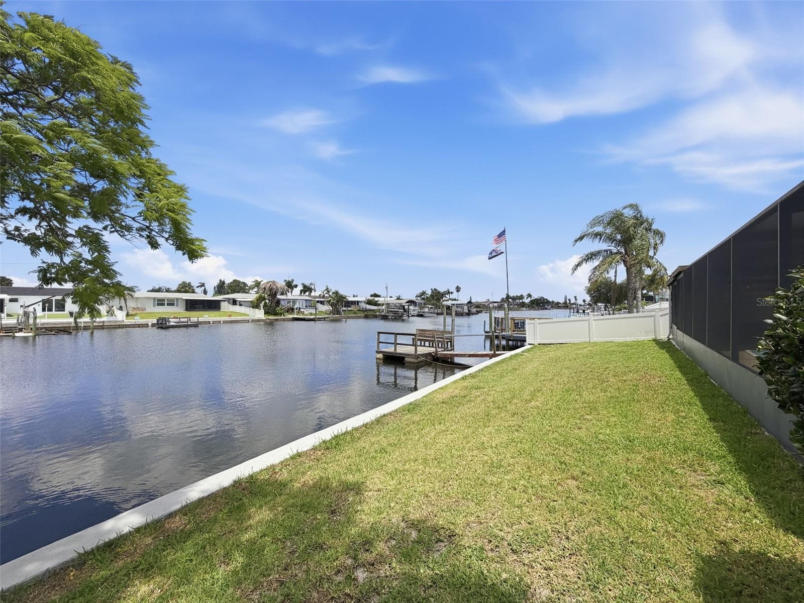 Reinforced seawall completed by Magic Poly Solutions in 2026. - 12735 1ST ISLE, HUDSON