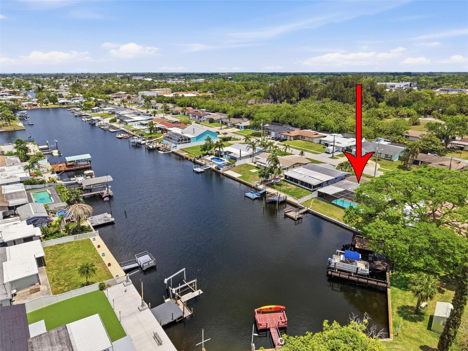Aerial view highlights the home’s waterfront lot location. - 12735 1ST ISLE, HUDSON