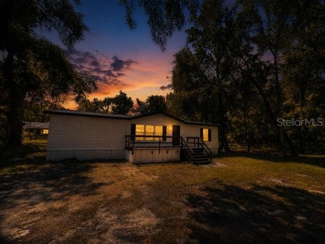 Dusk Staged photo - 11898 SW 36TH WAY, WEBSTER