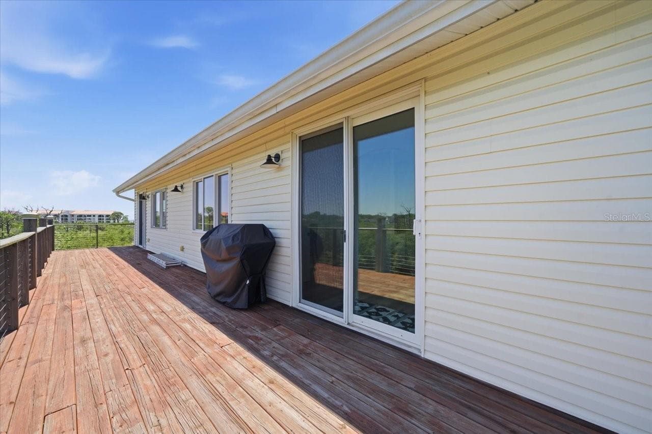 Kitchen sliders looking west - 1130 S FLORIDA AVE, TARPON SPRINGS