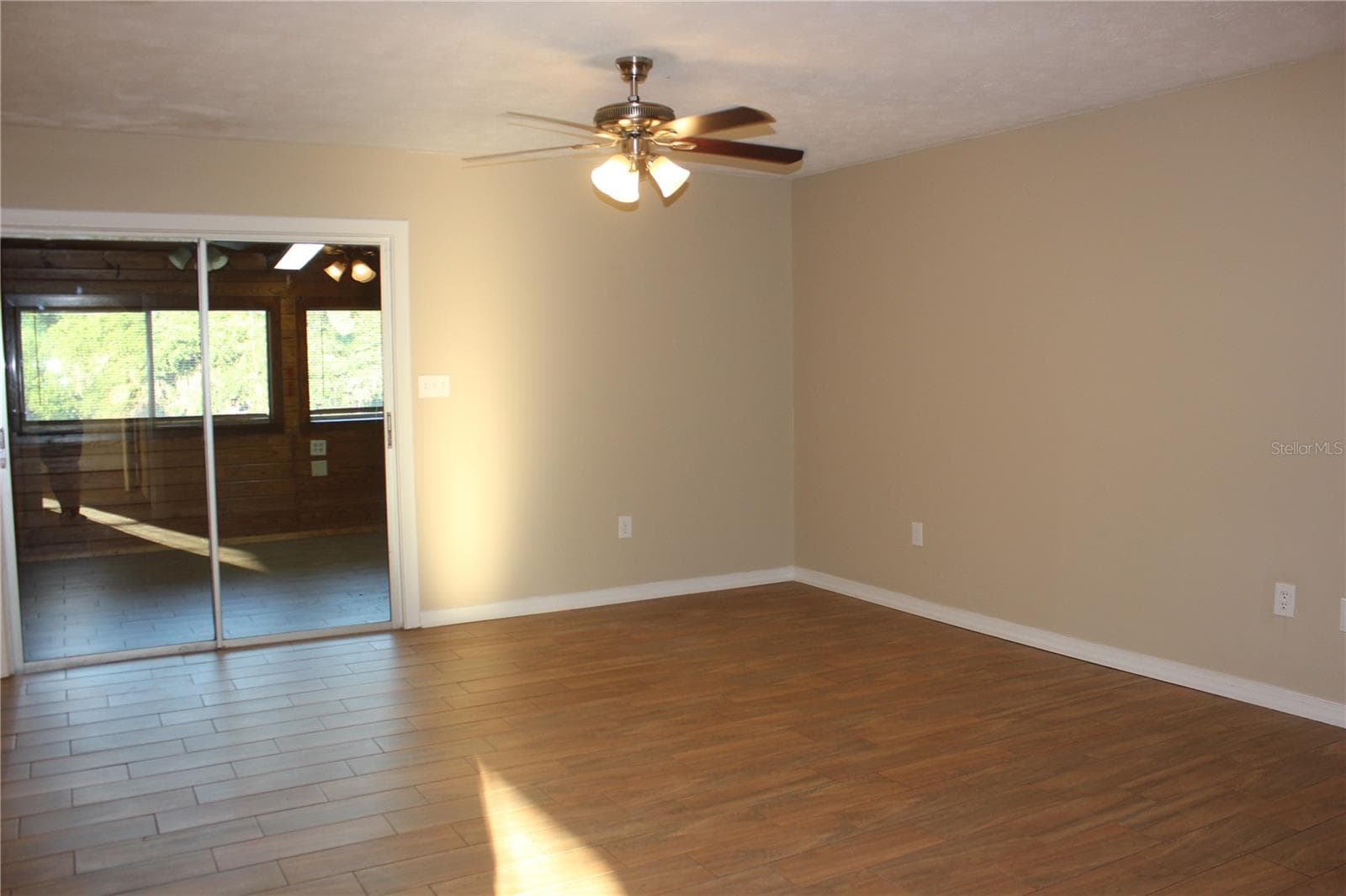 lg family room - 9082 ACORN BLVD, PUNTA GORDA