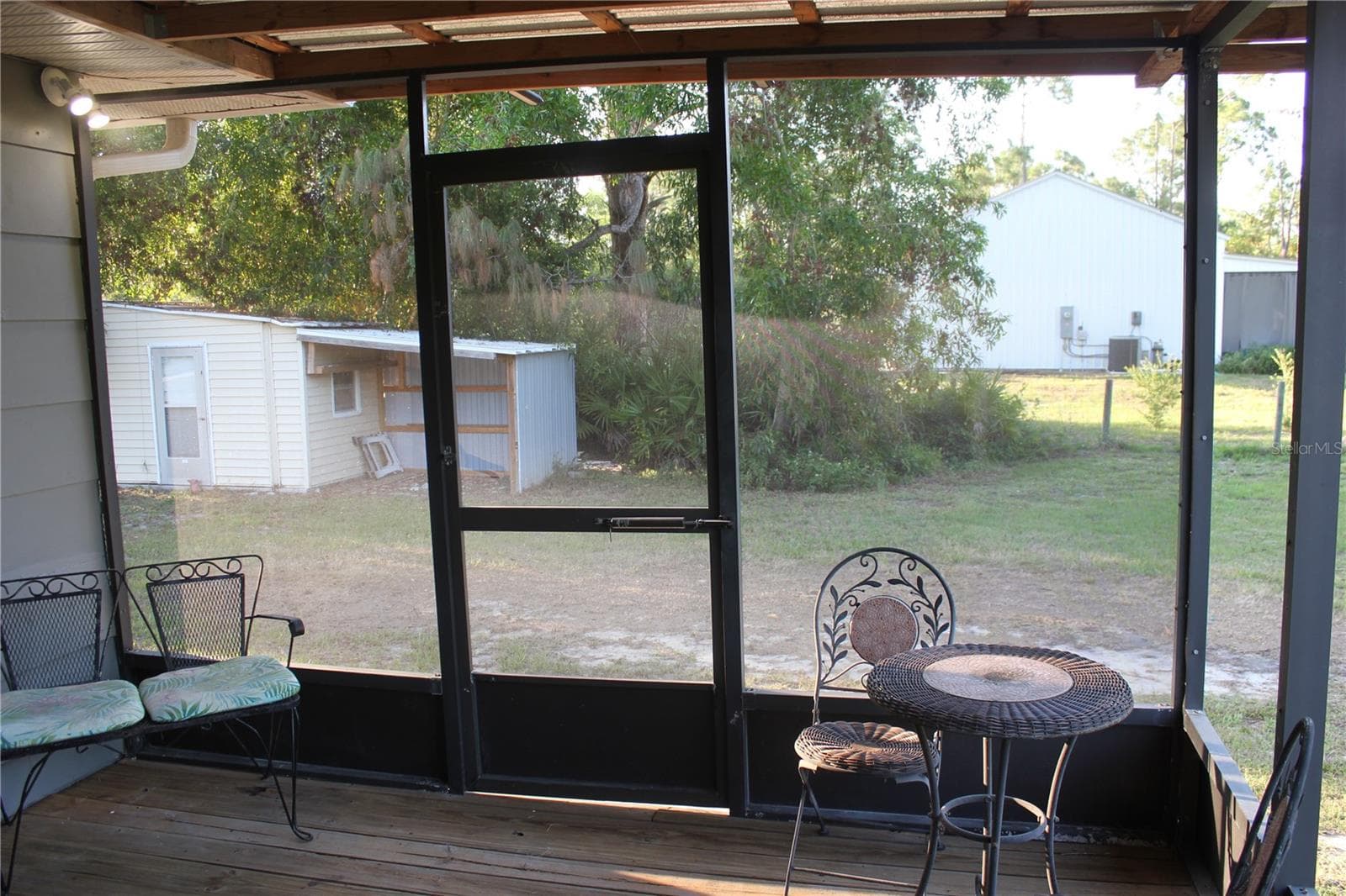 screen porch - 9082 ACORN BLVD, PUNTA GORDA