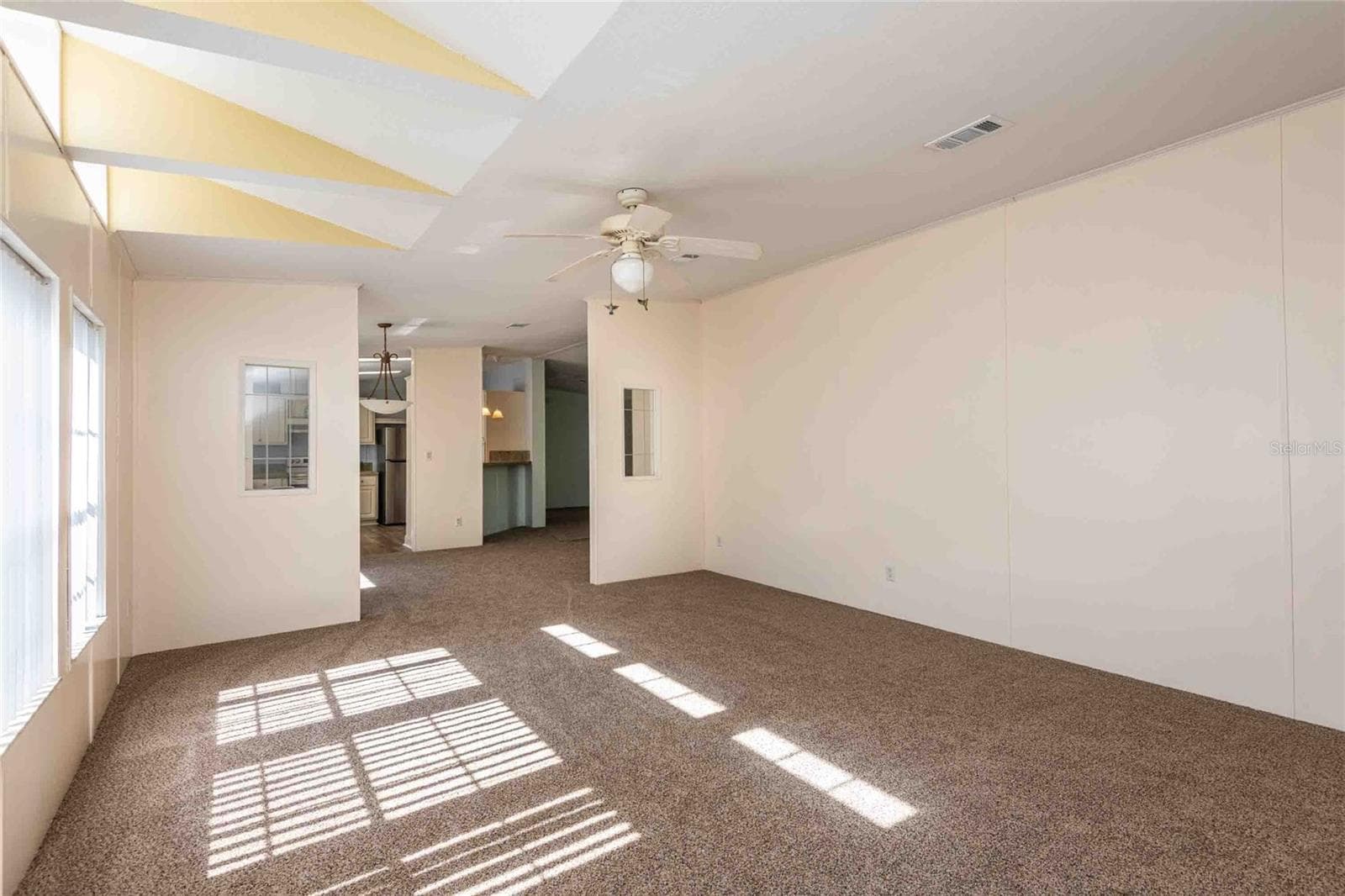 View from front door into living room. - 14221 HURRICANE DR, WEEKI WACHEE