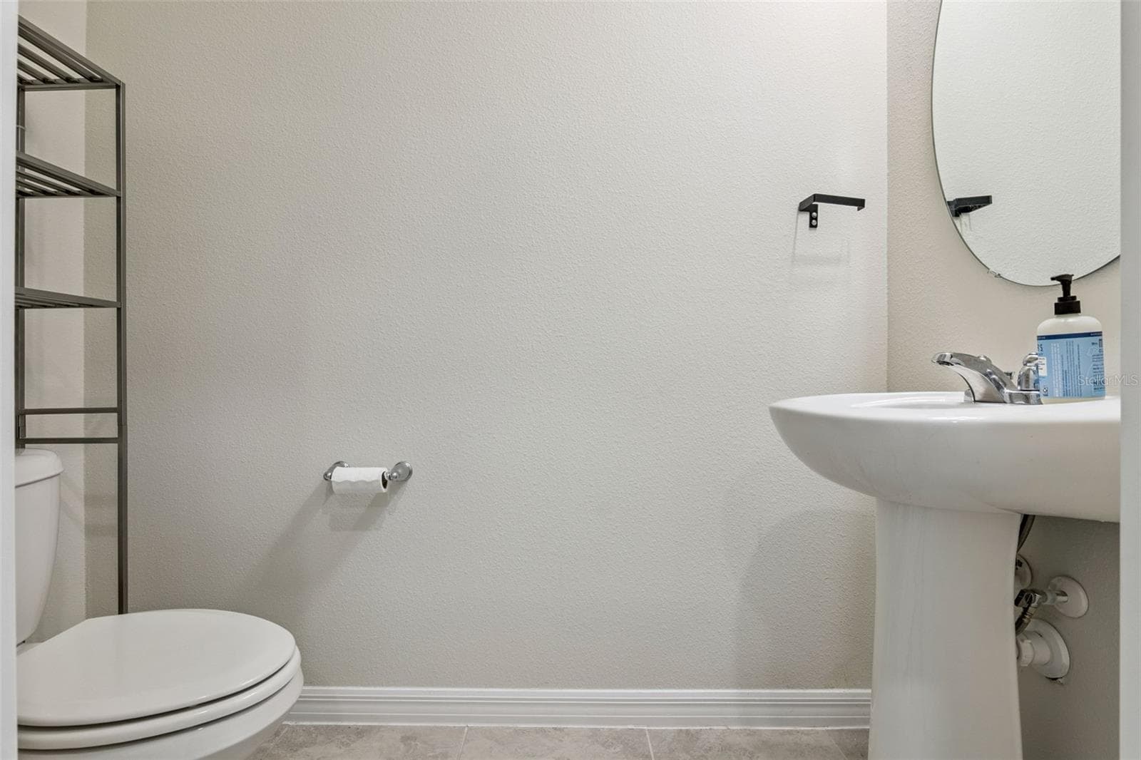 Downstairs powder room - 4062 FEATHER TREE DR, APOPKA