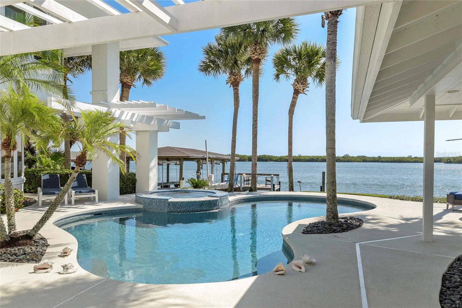 Heated Spa and Pool perfectly centered for access from every vantage point - 1215 COMMODORE DR, NEW SMYRNA BEACH