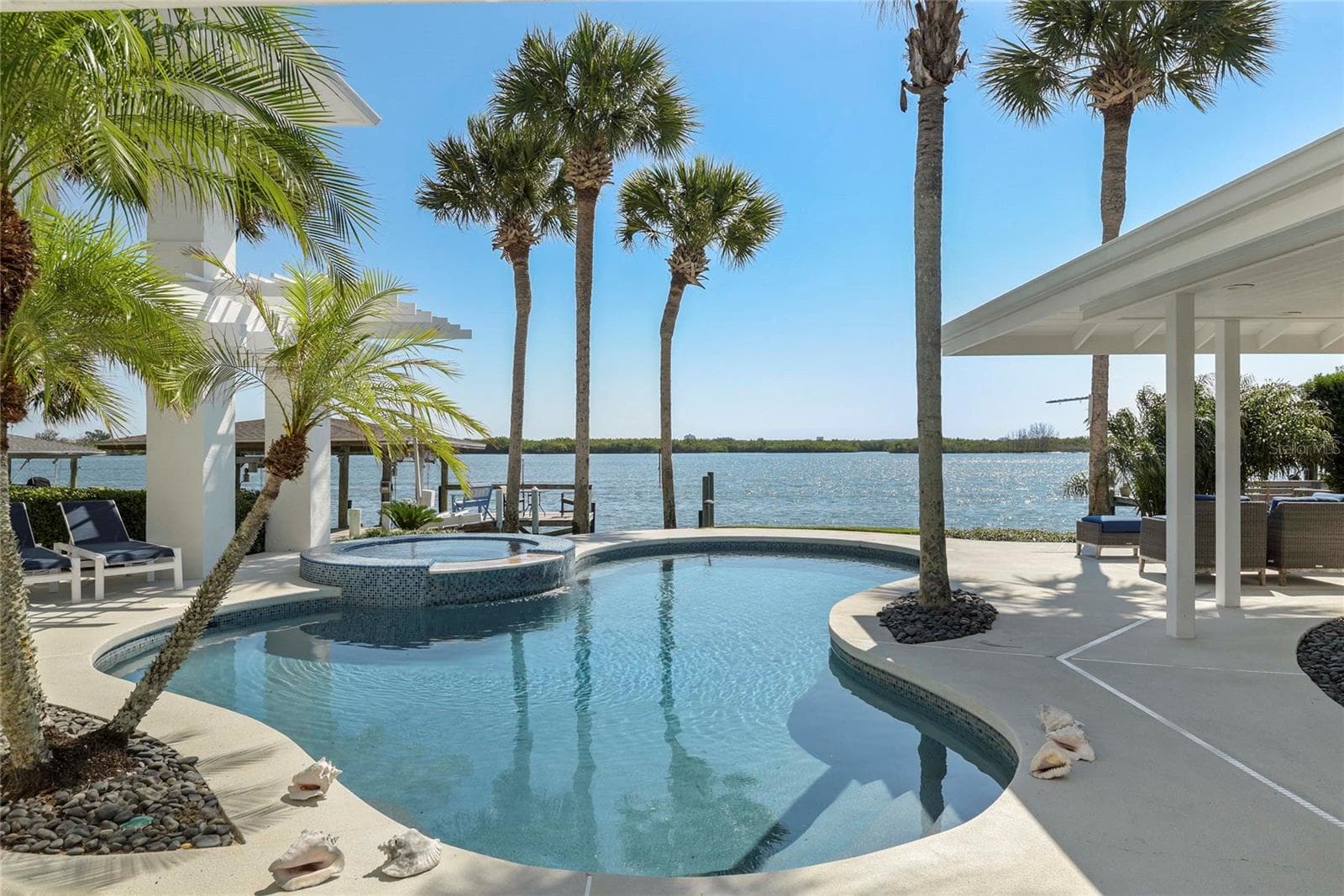 Heated Spa and Pool perfectly centered for access from every vantage point - 1215 COMMODORE DR, NEW SMYRNA BEACH