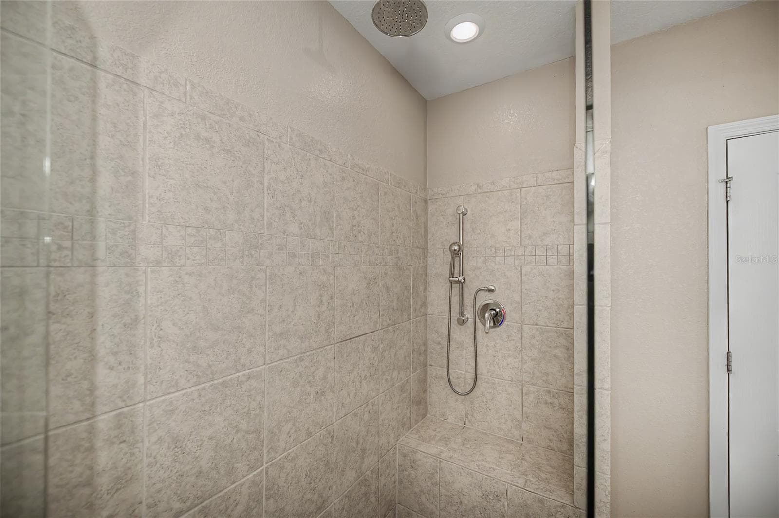Walk-In Shower with Seamless Glass Enclosure. - 640 ENCARNACION ST, PUNTA GORDA