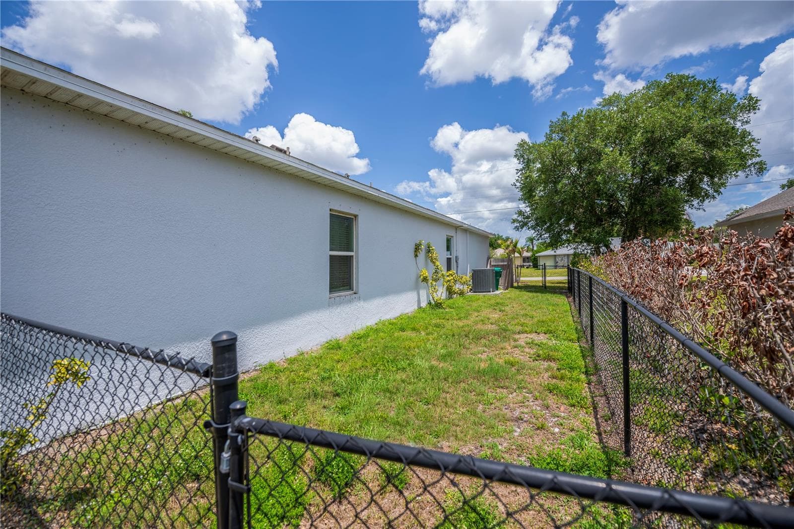Fenced Side Yard. - 640 ENCARNACION ST, PUNTA GORDA