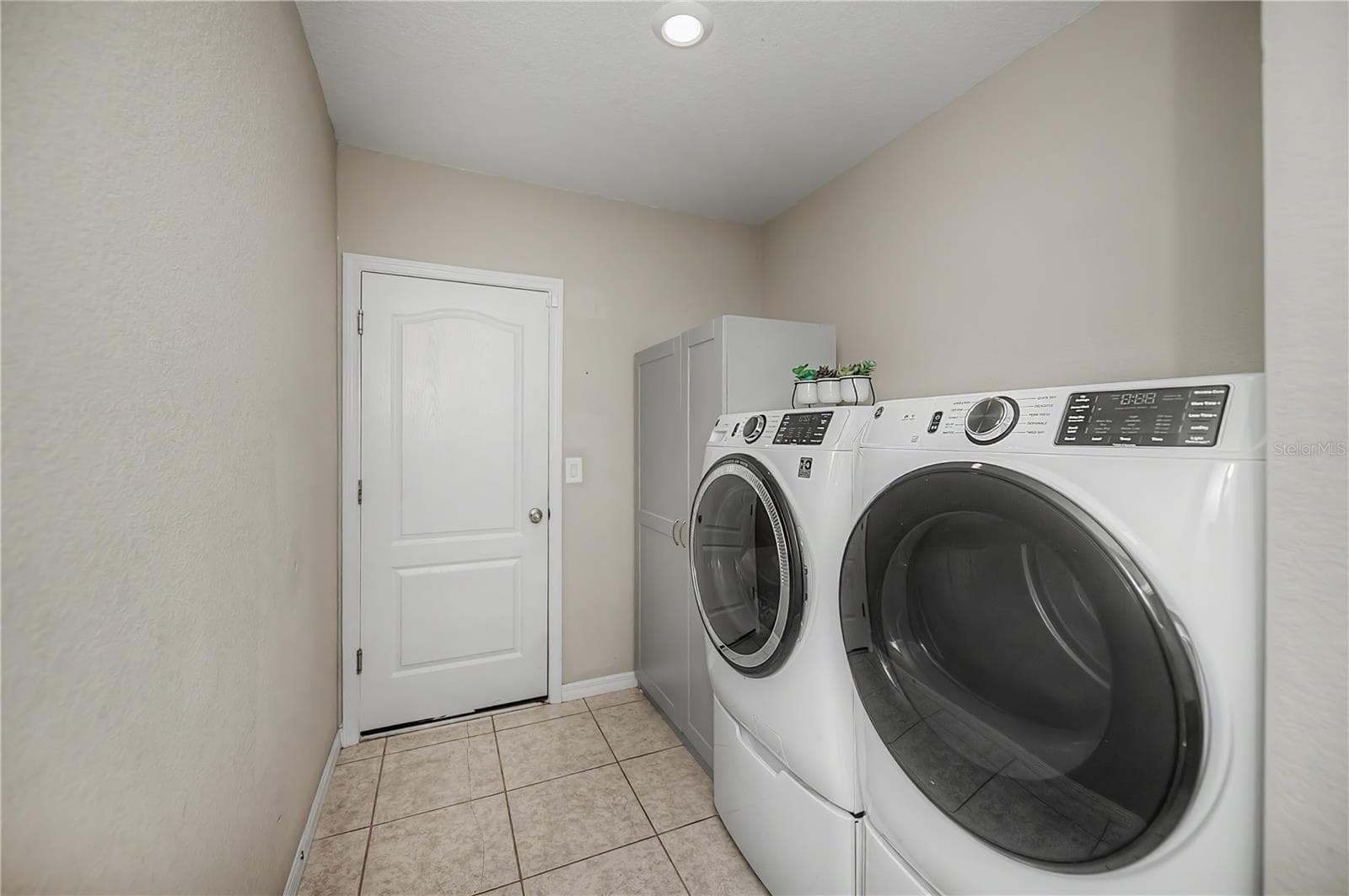 Spacious Interior Laundry Room with Additional Storage. - 640 ENCARNACION ST, PUNTA GORDA