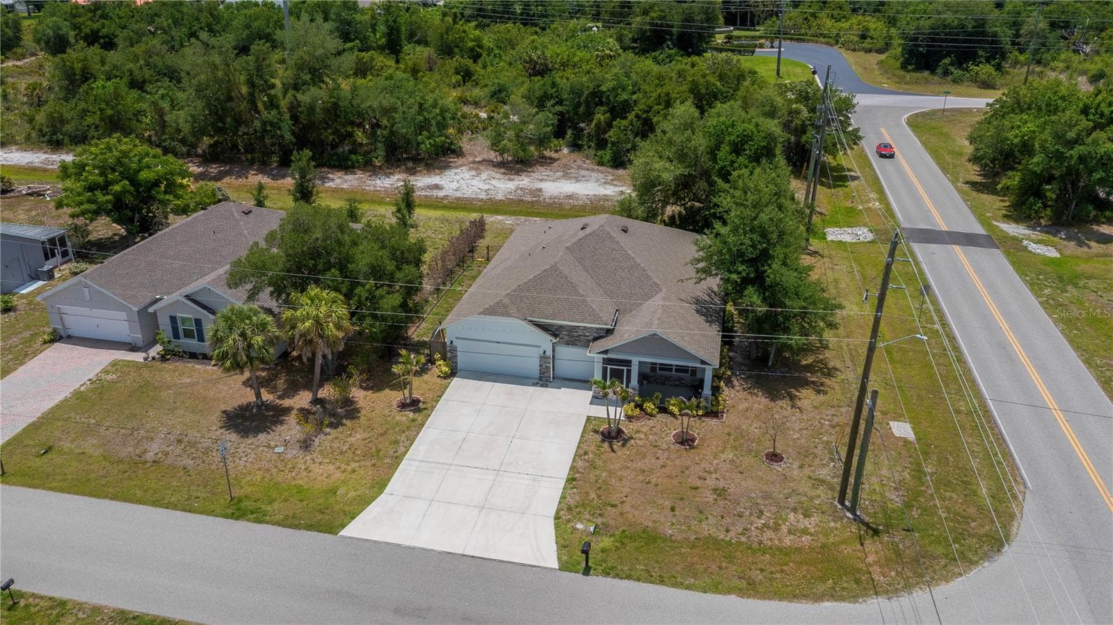 Corner Lot with Expansive backyard and Wooded Greenbelt Buffer. - 640 ENCARNACION ST, PUNTA GORDA